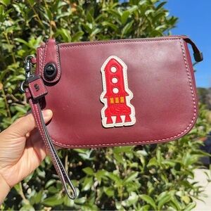 EUC Coach Turnlock Pouch With Varsity Patches 57198